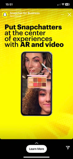 Screenshot shows how to use instagram stories ads. There's an ad for Snapchat for Business, with the headline, Put Snapchatters at the center of experiences with AR and video. At the bottom, there's a CTA button with the words "Learn more".