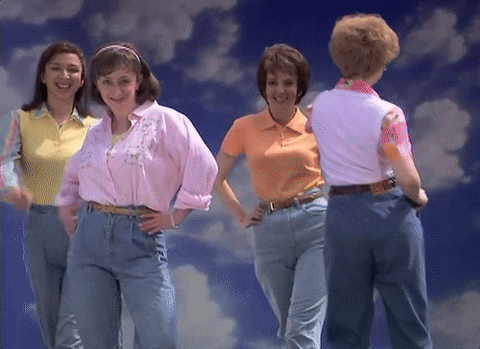 A gif image of four women posing while using mom jeans, representing us as a mother's day marketing ideas provider.