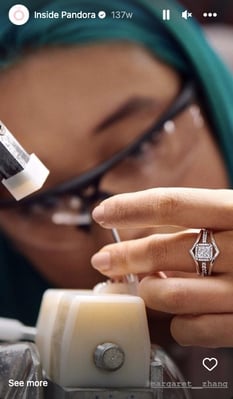Screenshot shows a story in Pandora's highlights on Instagram. In the story, there's a photo of a person making jewelry. Sharing the behind-the-scenes is part of Pandora's content marketing strategy.